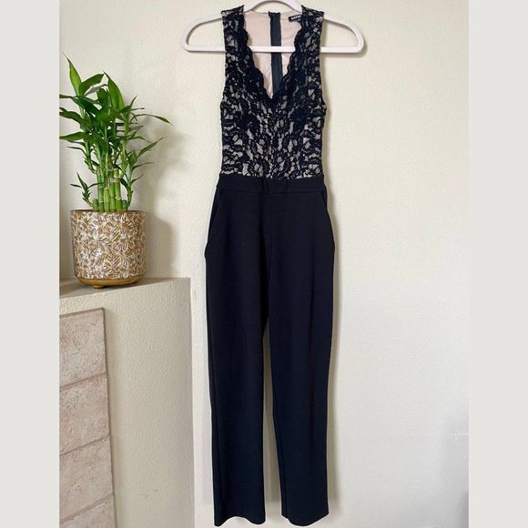 Express Pants - Express Open Back Lace Jumpsuit in Black